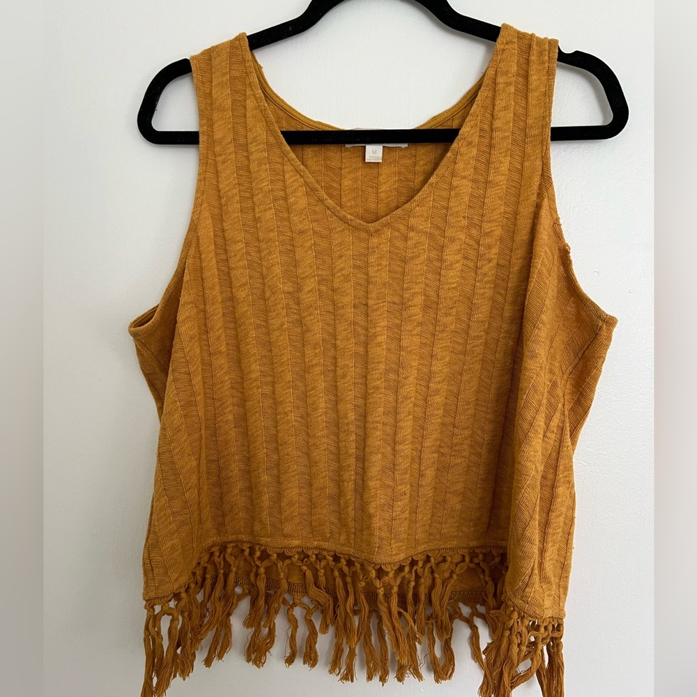 Mustard colored light sweater tank top from Anthropologie